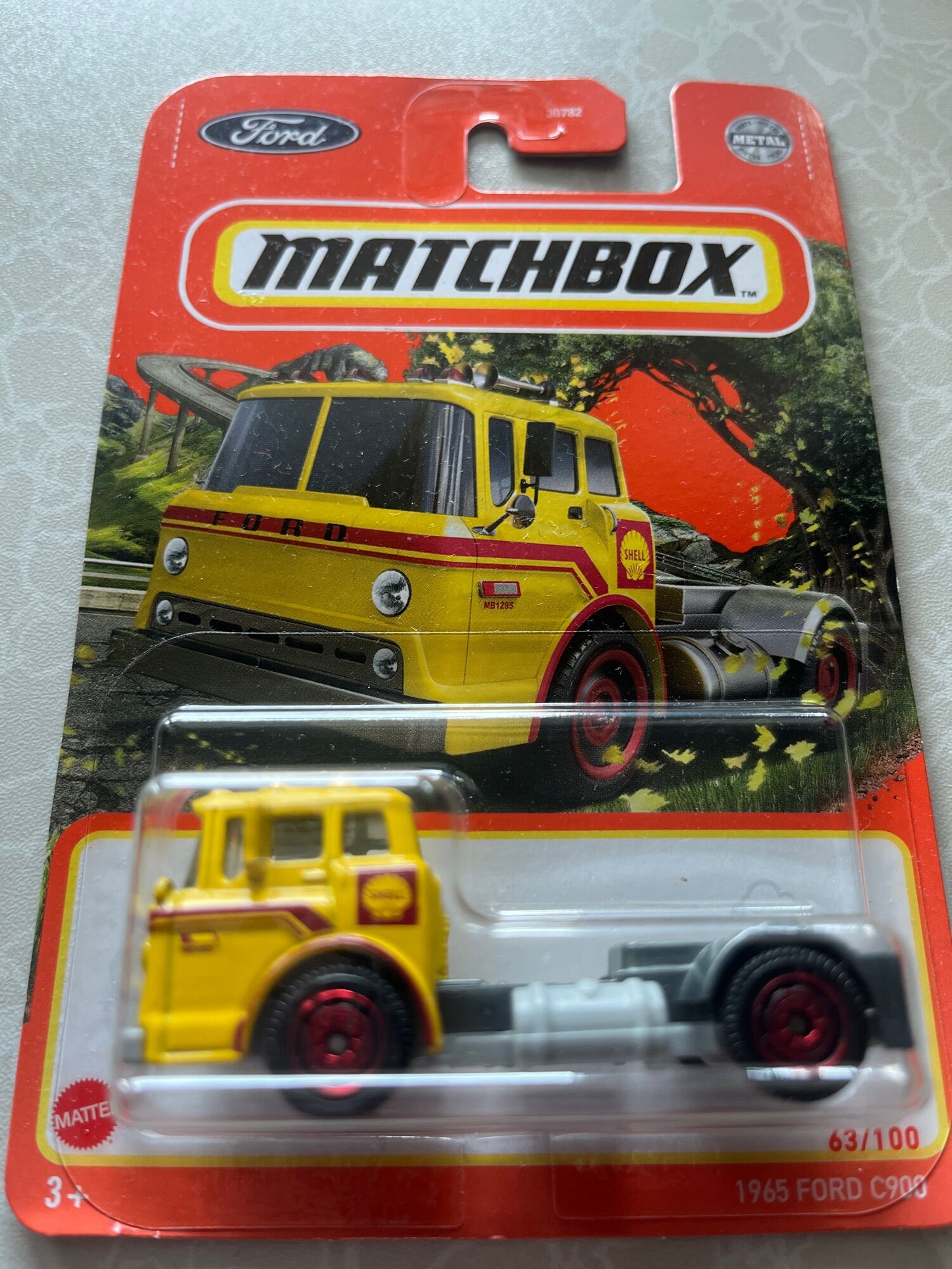 Matchbox 1965 Ford C900 – Rot, 1:64, Modellauto, Mainline-Serie, 18/100