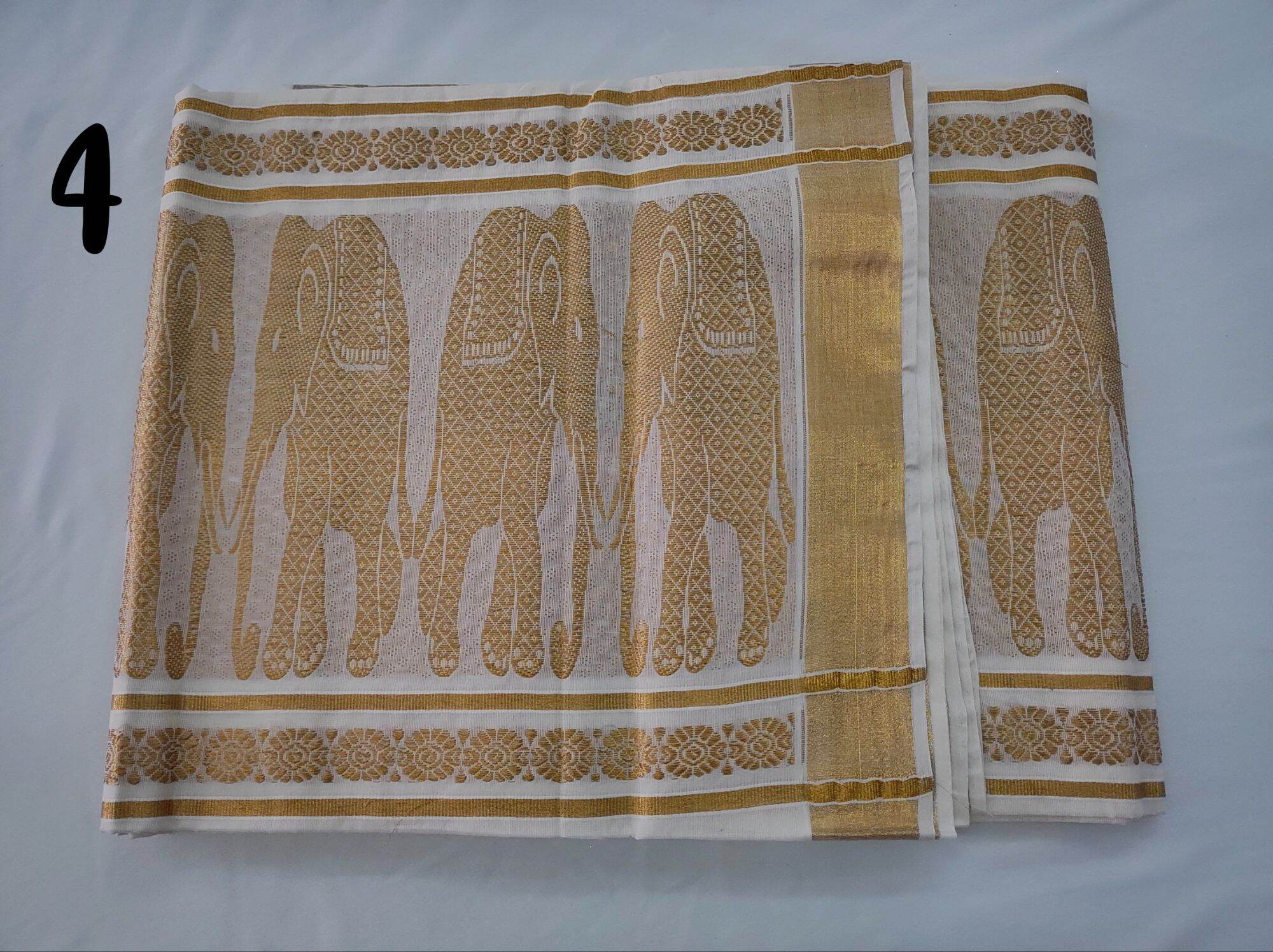 White Kerala Cotton Saree with Copper Zari Peacock
