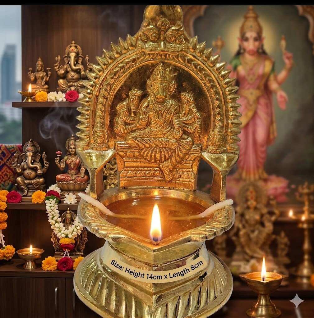 Brass Varaahi Amman Vilakku – 14cm  Traditional brass oil lamp with Varaahi Amman design perfect for pooja and home altar. Compact 14cm size elegant and durable.